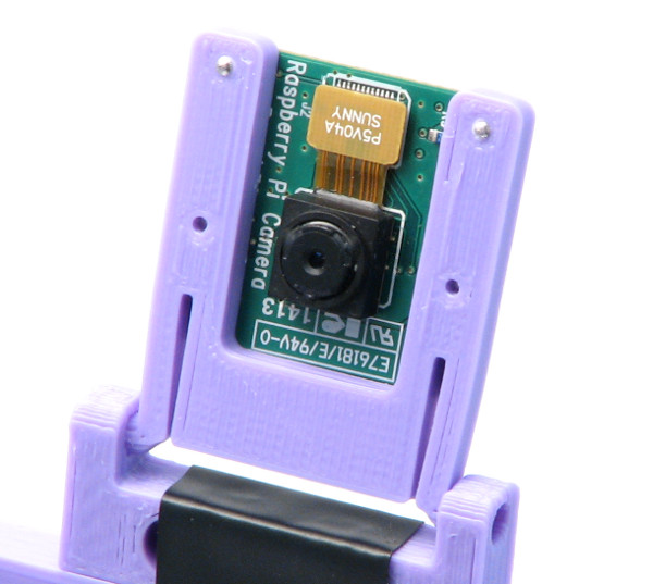 Attach camera to the base on its hinge
